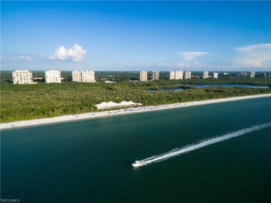 This exquisite villa, masterfully renovated in 2023 by The on Club at Pelican Bay Golf Course in Florida - for sale on GolfHomes.com, golf home, golf lot