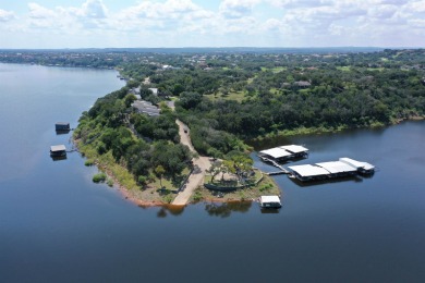 Nestled on a beautifully landscaped lot overlooking the Palmer on Palmer Lakeside At Barton Creek in Texas - for sale on GolfHomes.com, golf home, golf lot