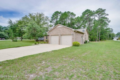 Welcome to 1513 Caracara Drive - Comfort, Style & Security in on Harbour Point Golf Club in North Carolina - for sale on GolfHomes.com, golf home, golf lot