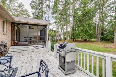 Welcome to 1513 Caracara Drive - Comfort, Style & Security in on Harbour Point Golf Club in North Carolina - for sale on GolfHomes.com, golf home, golf lot