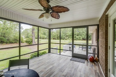 Welcome to 1513 Caracara Drive - Comfort, Style & Security in on Harbour Point Golf Club in North Carolina - for sale on GolfHomes.com, golf home, golf lot