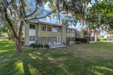 Move right in to this spacious unit with new plank flooring on Country Club At Silver Springs Shores in Florida - for sale on GolfHomes.com, golf home, golf lot