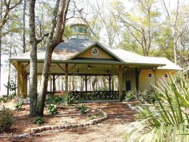 This home was featured in the 2014 Parade of Homes. Situated on on Members Club At St. James Plantation in North Carolina - for sale on GolfHomes.com, golf home, golf lot