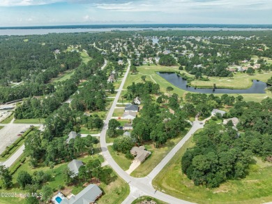 Welcome to 1513 Caracara Drive - Comfort, Style & Security in on Harbour Point Golf Club in North Carolina - for sale on GolfHomes.com, golf home, golf lot