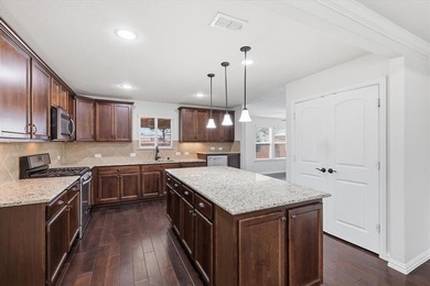 Beautiful Taft Street Model Home in the prestigious 55+ Active on Frisco Lakes Golf Course in Texas - for sale on GolfHomes.com, golf home, golf lot