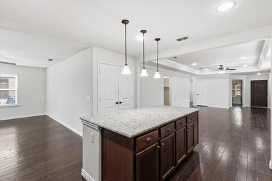 Beautiful Taft Street Model Home in the prestigious 55+ Active on Frisco Lakes Golf Course in Texas - for sale on GolfHomes.com, golf home, golf lot