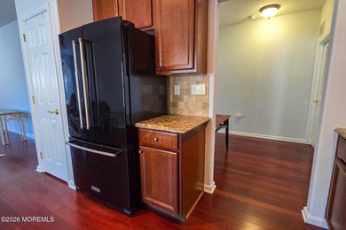 Extended Aragon model with four-season sunroom and front porch on Renaissance Country Club in New Jersey - for sale on GolfHomes.com, golf home, golf lot