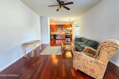 Extended Aragon model with four-season sunroom and front porch on Renaissance Country Club in New Jersey - for sale on GolfHomes.com, golf home, golf lot