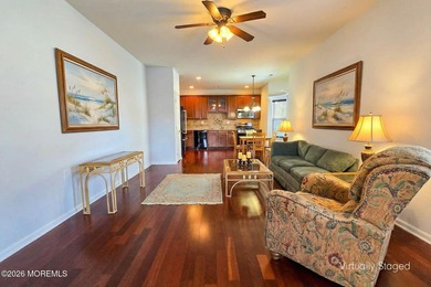 Extended Aragon model with four-season sunroom and front porch on Renaissance Country Club in New Jersey - for sale on GolfHomes.com, golf home, golf lot