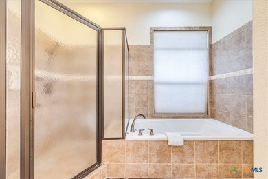 Welcome home to 302 Guadalupe River Drive, a custom waterfront on Golf Club of Seguin in Texas - for sale on GolfHomes.com, golf home, golf lot