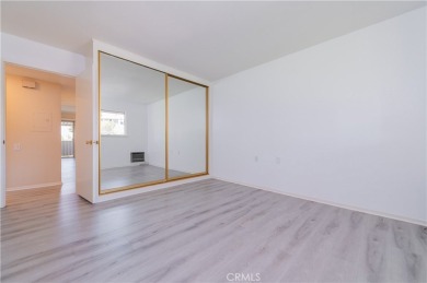 Beautiful *Castilla* model condo is a bright and clean condo on Laguna Woods Village Golf Course in California - for sale on GolfHomes.com, golf home, golf lot