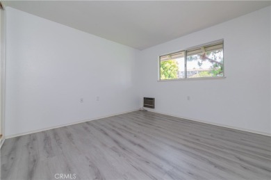 Beautiful *Castilla* model condo is a bright and clean condo on Laguna Woods Village Golf Course in California - for sale on GolfHomes.com, golf home, golf lot