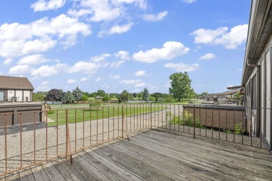 Incredible end unit ranch overlooking the pond and pier in this on St. Clair Shores Country Club in Michigan - for sale on GolfHomes.com, golf home, golf lot