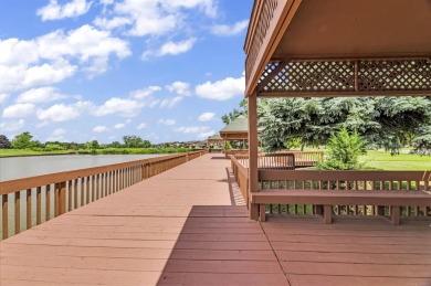 Incredible end unit ranch overlooking the pond and pier in this on St. Clair Shores Country Club in Michigan - for sale on GolfHomes.com, golf home, golf lot