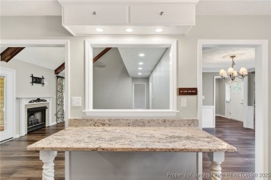 Welcome to 1215 Four Wood Drive, a beautifully updated home on a on Baywood Golf Club in North Carolina - for sale on GolfHomes.com, golf home, golf lot