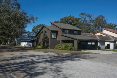 Swiss Chalet style home in Central Lakeland close to on Cleveland Heights Golf Course in Florida - for sale on GolfHomes.com, golf home, golf lot