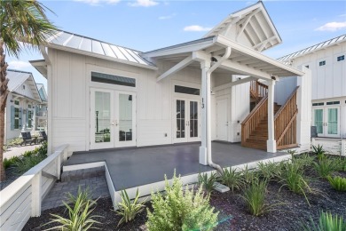 This charming two-bedroom, two-bathroom beach cabin offers 900 on Palmilla Beach Golf Club in Texas - for sale on GolfHomes.com, golf home, golf lot