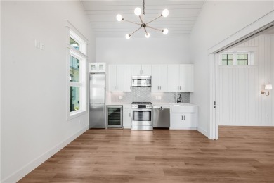 This charming two-bedroom, two-bathroom beach cabin offers 900 on Palmilla Beach Golf Club in Texas - for sale on GolfHomes.com, golf home, golf lot