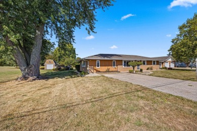 This stunning all-brick ranch home is situated on over an acre on Park Shore Golf Course in Michigan - for sale on GolfHomes.com, golf home, golf lot