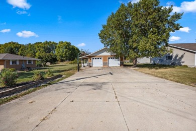 This stunning all-brick ranch home is situated on over an acre on Park Shore Golf Course in Michigan - for sale on GolfHomes.com, golf home, golf lot