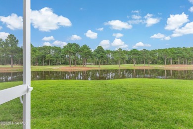 Don't Miss This First Floor - Golf  Pond View Condo in Sandpiper on Sandpiper Bay Golf and Country Club in North Carolina - for sale on GolfHomes.com, golf home, golf lot