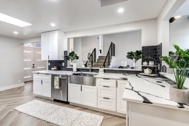 An amazing contemporary split-level home near Arroyo Del Oso on Arroyo Del Oso Golf Course in New Mexico - for sale on GolfHomes.com, golf home, golf lot