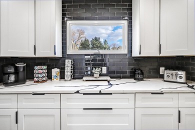 An amazing contemporary split-level home near Arroyo Del Oso on Arroyo Del Oso Golf Course in New Mexico - for sale on GolfHomes.com, golf home, golf lot