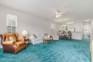 Don't Miss This First Floor - Golf  Pond View Condo in Sandpiper on Sandpiper Bay Golf and Country Club in North Carolina - for sale on GolfHomes.com, golf home, golf lot