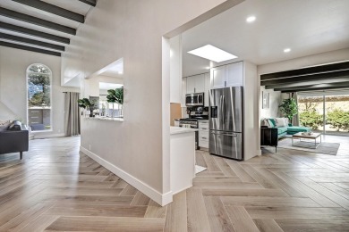 An amazing contemporary split-level home near Arroyo Del Oso on Arroyo Del Oso Golf Course in New Mexico - for sale on GolfHomes.com, golf home, golf lot
