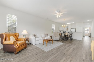 Don't Miss This First Floor - Golf  Pond View Condo in Sandpiper on Sandpiper Bay Golf and Country Club in North Carolina - for sale on GolfHomes.com, golf home, golf lot