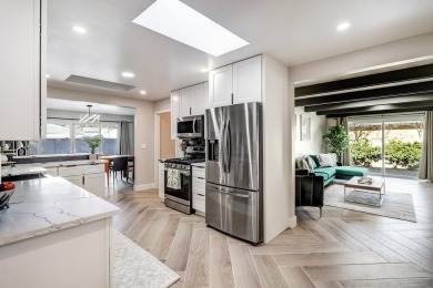 An amazing contemporary split-level home near Arroyo Del Oso on Arroyo Del Oso Golf Course in New Mexico - for sale on GolfHomes.com, golf home, golf lot