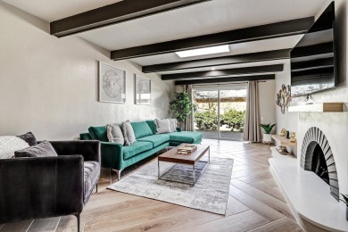 An amazing contemporary split-level home near Arroyo Del Oso on Arroyo Del Oso Golf Course in New Mexico - for sale on GolfHomes.com, golf home, golf lot