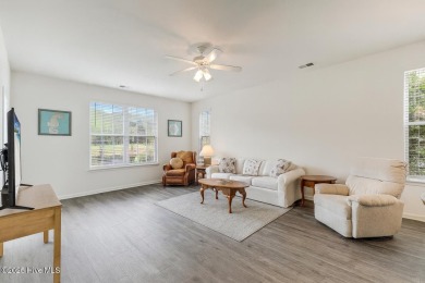 Don't Miss This First Floor - Golf  Pond View Condo in Sandpiper on Sandpiper Bay Golf and Country Club in North Carolina - for sale on GolfHomes.com, golf home, golf lot