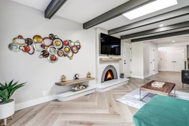 An amazing contemporary split-level home near Arroyo Del Oso on Arroyo Del Oso Golf Course in New Mexico - for sale on GolfHomes.com, golf home, golf lot