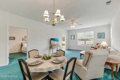 Don't Miss This First Floor - Golf  Pond View Condo in Sandpiper on Sandpiper Bay Golf and Country Club in North Carolina - for sale on GolfHomes.com, golf home, golf lot