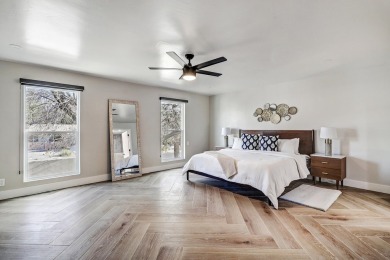 An amazing contemporary split-level home near Arroyo Del Oso on Arroyo Del Oso Golf Course in New Mexico - for sale on GolfHomes.com, golf home, golf lot