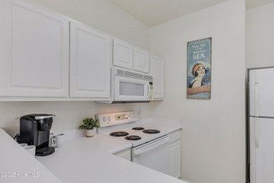Don't Miss This First Floor - Golf  Pond View Condo in Sandpiper on Sandpiper Bay Golf and Country Club in North Carolina - for sale on GolfHomes.com, golf home, golf lot