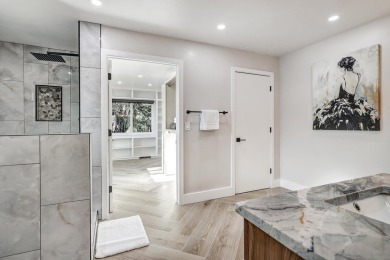 An amazing contemporary split-level home near Arroyo Del Oso on Arroyo Del Oso Golf Course in New Mexico - for sale on GolfHomes.com, golf home, golf lot