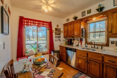 Enjoy stunning golf-front views of the #5 Fairway from the front on Bella Vista - Metfield Golf Complex and Country Club in Arkansas - for sale on GolfHomes.com, golf home, golf lot