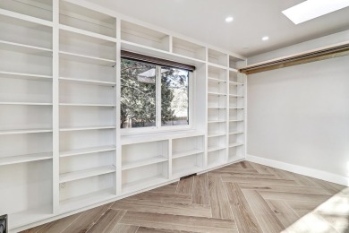 An amazing contemporary split-level home near Arroyo Del Oso on Arroyo Del Oso Golf Course in New Mexico - for sale on GolfHomes.com, golf home, golf lot