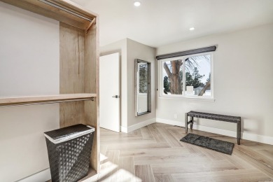 An amazing contemporary split-level home near Arroyo Del Oso on Arroyo Del Oso Golf Course in New Mexico - for sale on GolfHomes.com, golf home, golf lot