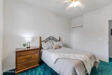 Don't Miss This First Floor - Golf  Pond View Condo in Sandpiper on Sandpiper Bay Golf and Country Club in North Carolina - for sale on GolfHomes.com, golf home, golf lot