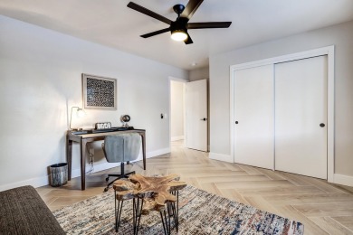 An amazing contemporary split-level home near Arroyo Del Oso on Arroyo Del Oso Golf Course in New Mexico - for sale on GolfHomes.com, golf home, golf lot