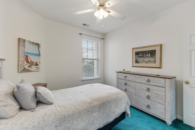 Don't Miss This First Floor - Golf  Pond View Condo in Sandpiper on Sandpiper Bay Golf and Country Club in North Carolina - for sale on GolfHomes.com, golf home, golf lot