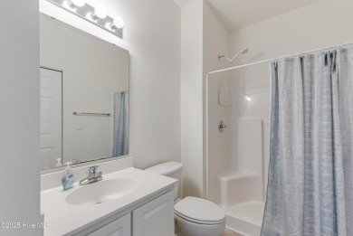 Don't Miss This First Floor - Golf  Pond View Condo in Sandpiper on Sandpiper Bay Golf and Country Club in North Carolina - for sale on GolfHomes.com, golf home, golf lot