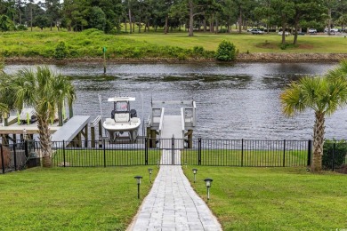 Experience the pinnacle of luxury waterfront living in this on Myrtlewood Golf Course and Club  in South Carolina - for sale on GolfHomes.com, golf home, golf lot