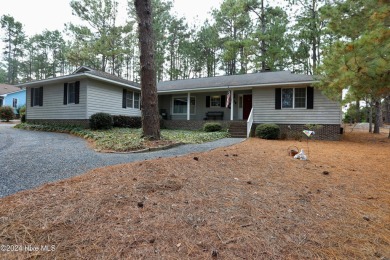 Great opportunity to own a single level ranch home in gated on Seven Lakes Country Club in North Carolina - for sale on GolfHomes.com, golf home, golf lot