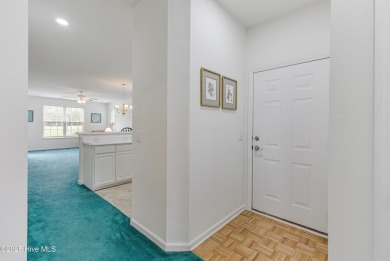 Don't Miss This First Floor - Golf  Pond View Condo in Sandpiper on Sandpiper Bay Golf and Country Club in North Carolina - for sale on GolfHomes.com, golf home, golf lot