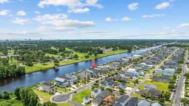 Experience the pinnacle of luxury waterfront living in this on Myrtlewood Golf Course and Club  in South Carolina - for sale on GolfHomes.com, golf home, golf lot