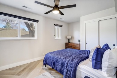 An amazing contemporary split-level home near Arroyo Del Oso on Arroyo Del Oso Golf Course in New Mexico - for sale on GolfHomes.com, golf home, golf lot